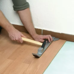 Escoplo profesional con yunque para alinear suelos laminados