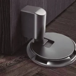 OVNI - Tope retenedor ultra fino para puertas de paso